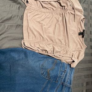 A cream color stretchy crop top